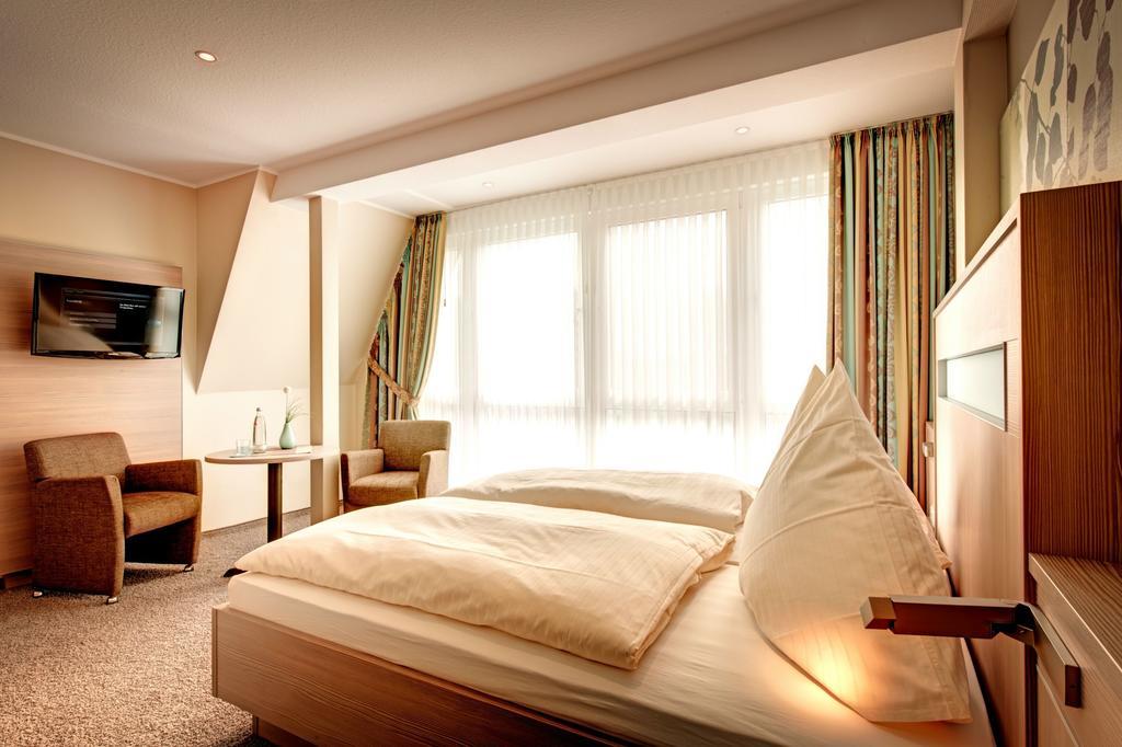Hotel Muschelgrund Куксгафен Номер фото